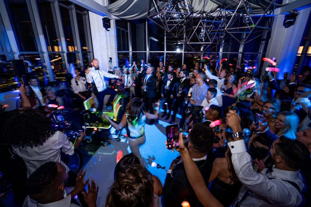 DJ Wrex playing to a full dance floor in Los Angeles