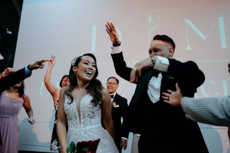 Bride and groom dancing with guests during their reception at Millwick, Los Angeles