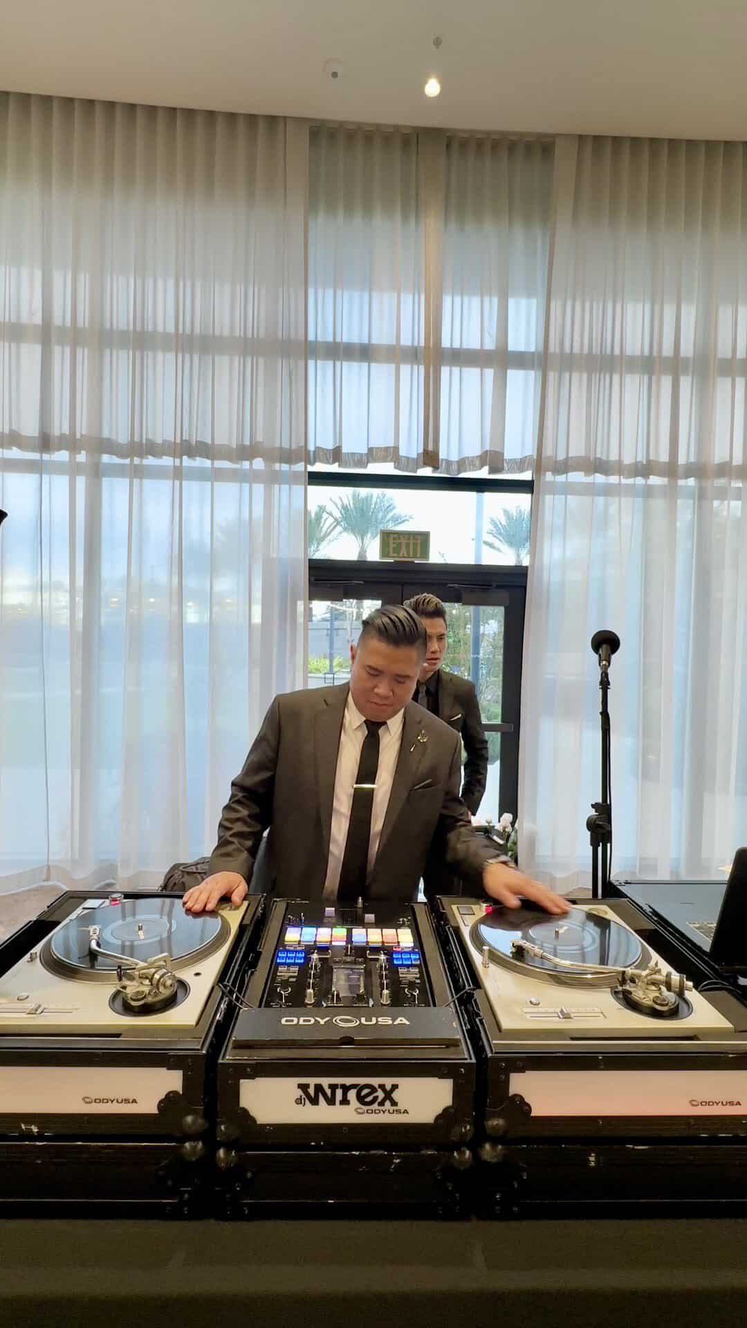 DJ Wrex scratching on turntables at a Los Angeles wedding