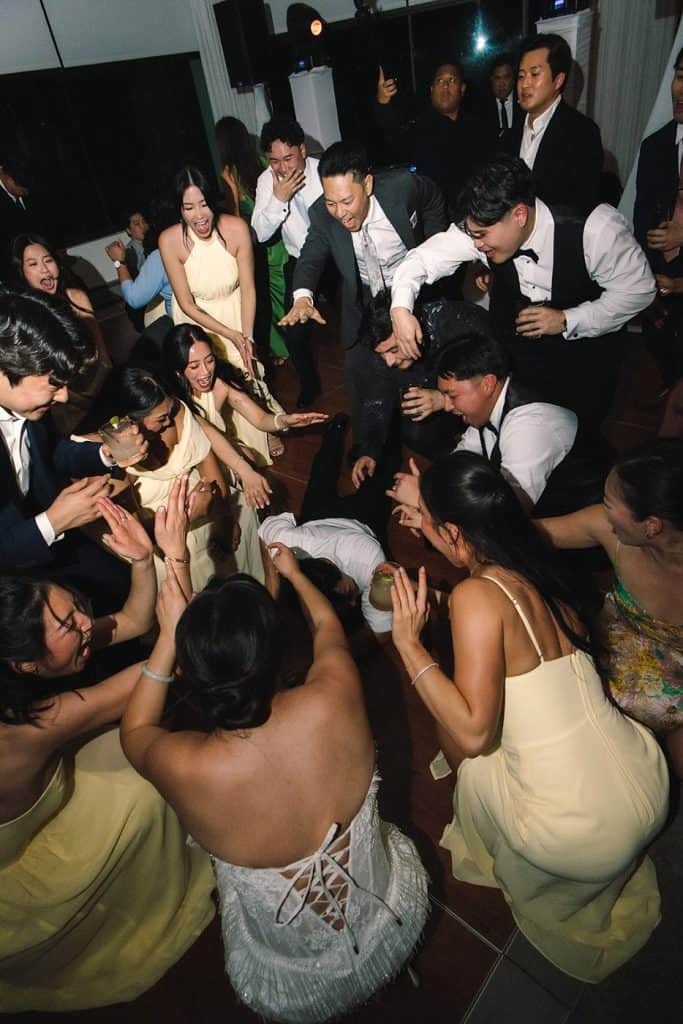 Crowd flash shot, bridesmaids on floor, Kristine & Patrick wedding at Bel-Air Bay Club