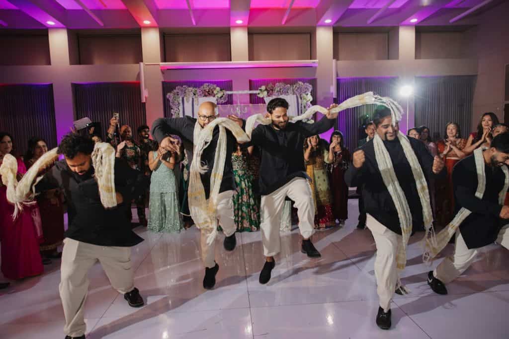 Groomsmen choreographed dance, purple uplights, Juliana & Alishan wedding at Enchanted Hills Estate