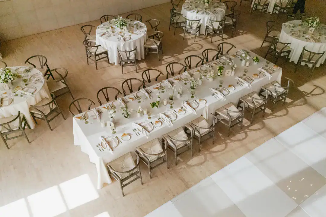 Overhead view of long and round reception tables in Grand Central at Grand Gimeno, Orange