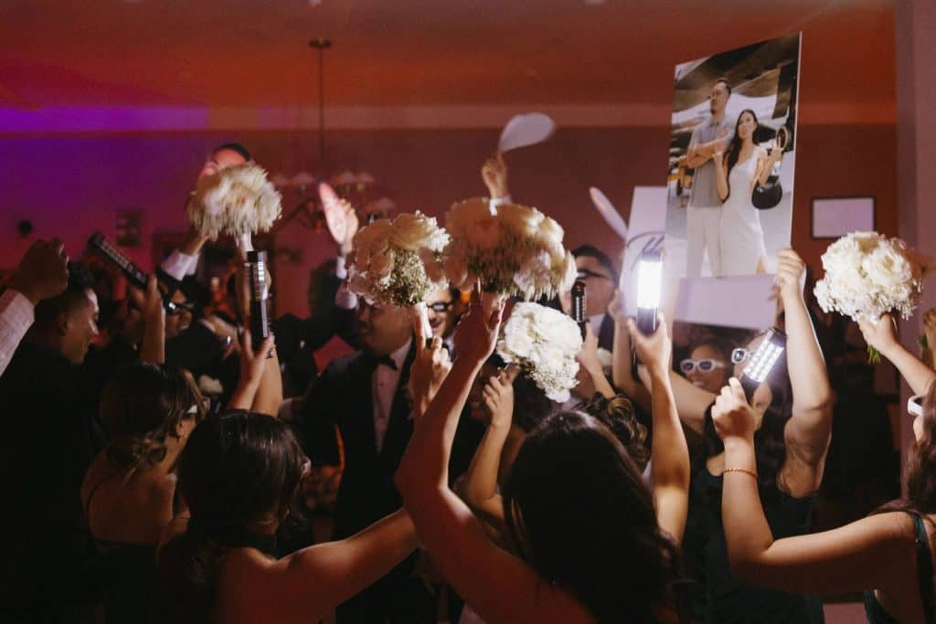 Packed floor, warm light, Abbey & Edward wedding at The Harper, Costa Mesa