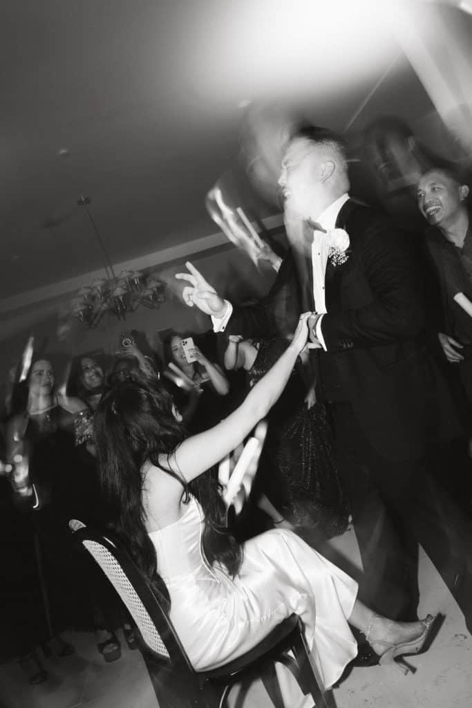 Crowd lifting groom, Abbey & Edward wedding at The Harper, Costa Mesa