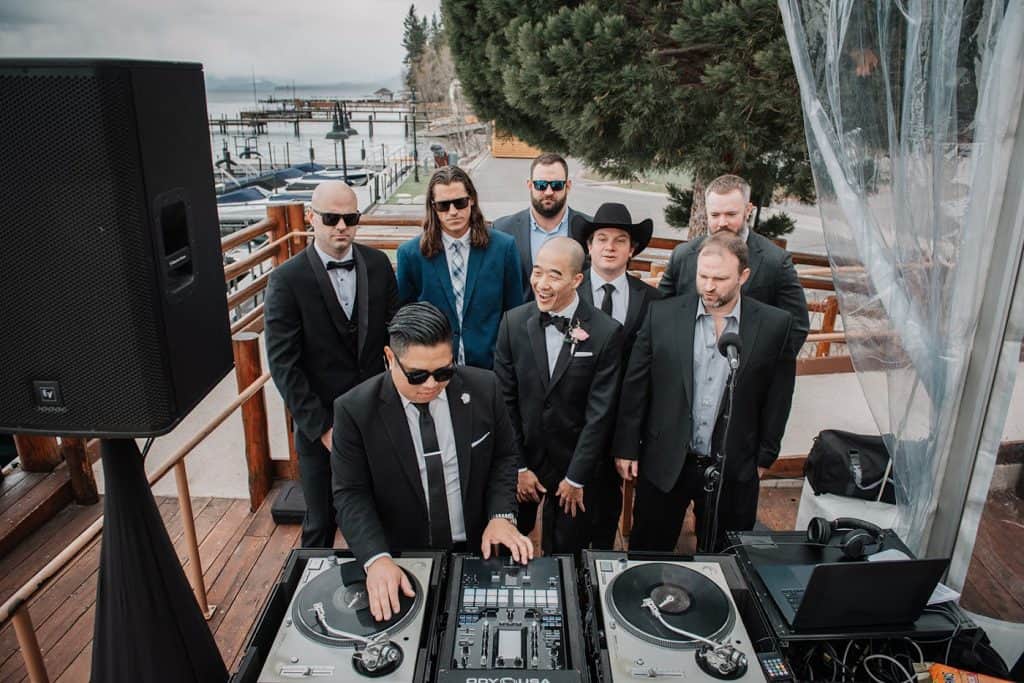 Groomsmen in shades posing behind turntables, David & Marissa wedding at Sunnyside, Lake Tahoe