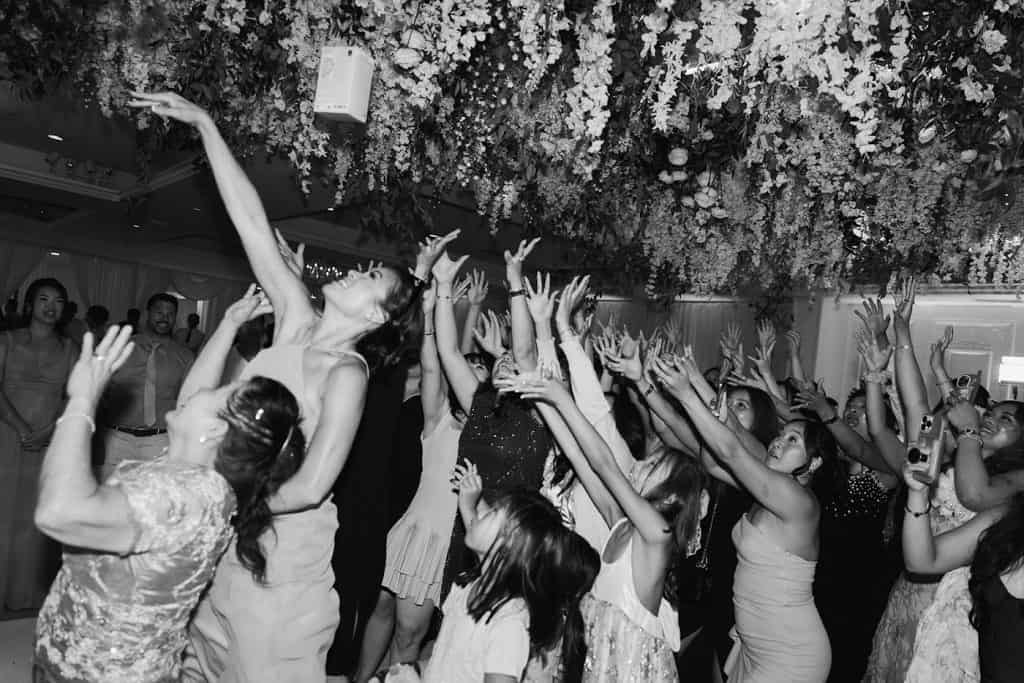 Black-and-white hands-up crowd, Sarah & Jeff wedding at Mon Cheri, Garden Grove