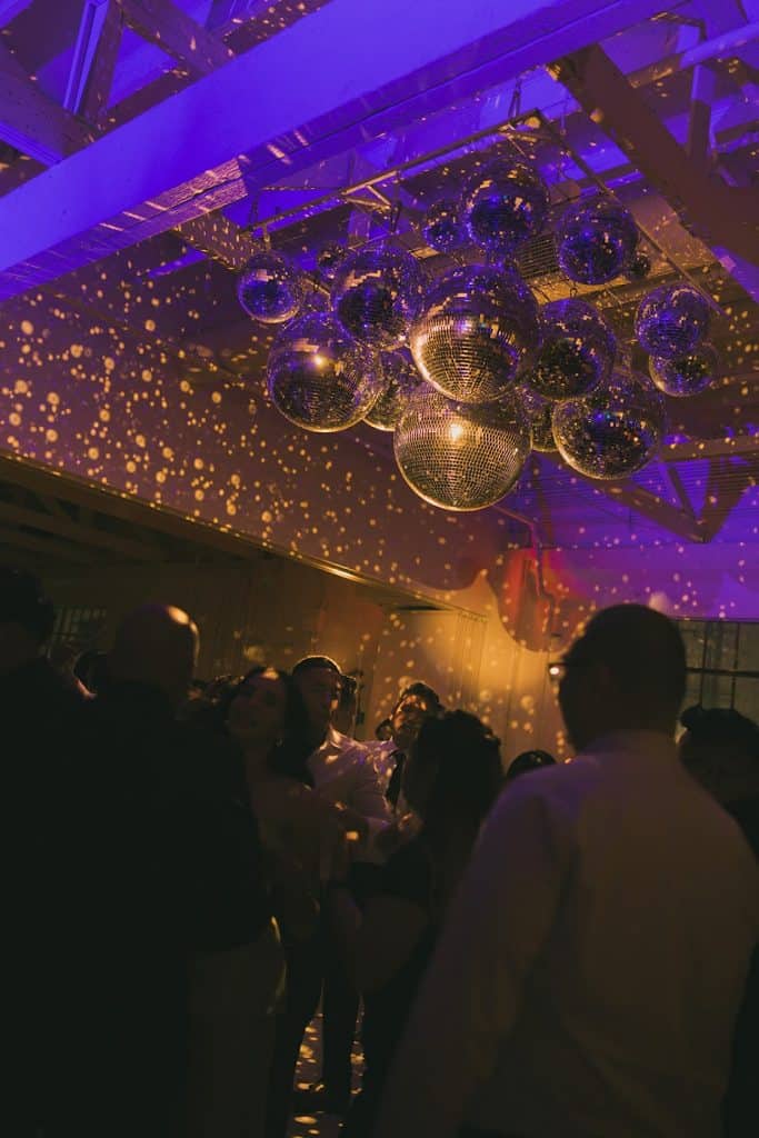 Purple disco-ball room wide, Crystal & Risen wedding at The Revery LA