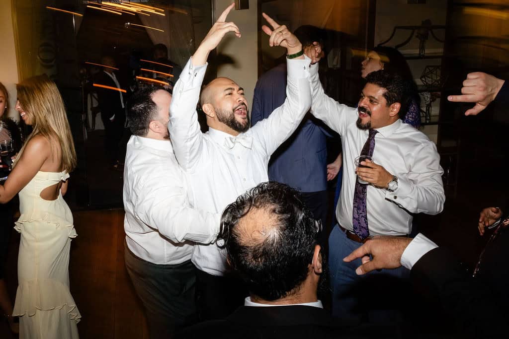 Guests hands up, Denise & Jonathan wedding at Villa & Vine, Santa Barbara