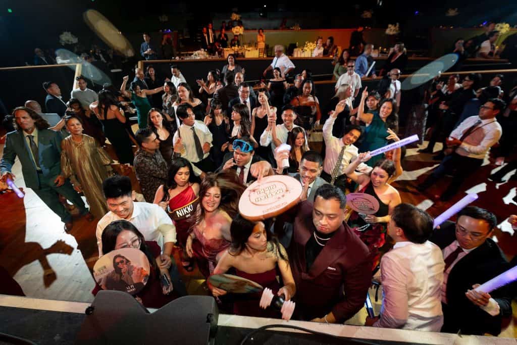 Crowd wide, hands up, Mariah & Nikki wedding at The Wiltern