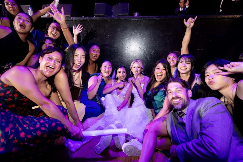 Crowd selfie-style, purple, Mariah & Nikki wedding at The Wiltern